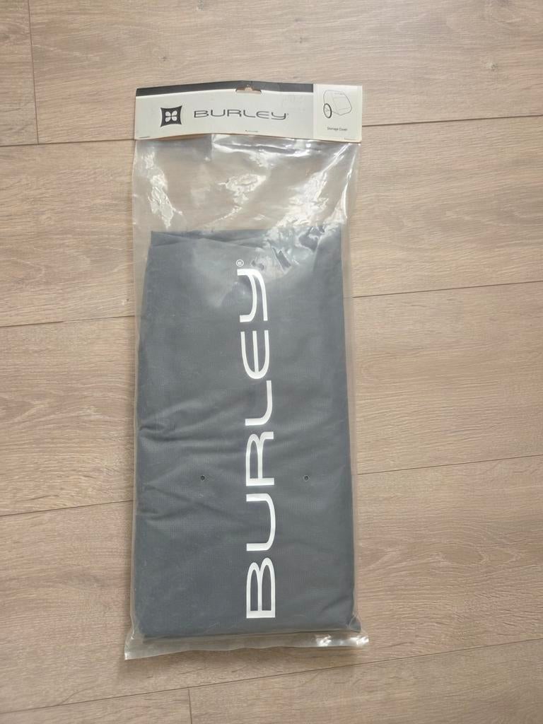 Burley beschermhoes voor fietskar, Ophalen