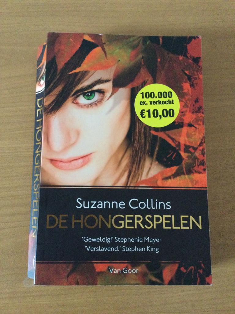 Suzanne Collins - De Hongerspelen, Boeken, Ophalen of Verzenden, Zo goed als nieuw