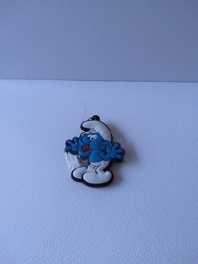 Smurf steekt zijn tong uit sleutelhanger, Verzamelen, Smurfen, Ophalen of Verzenden, Zo goed als nieuw
