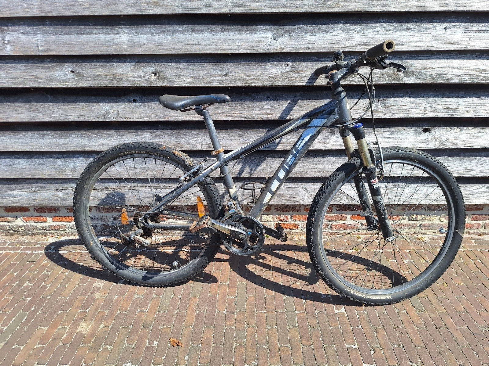 Een 3 tal (cross)mountainbikes, Ophalen