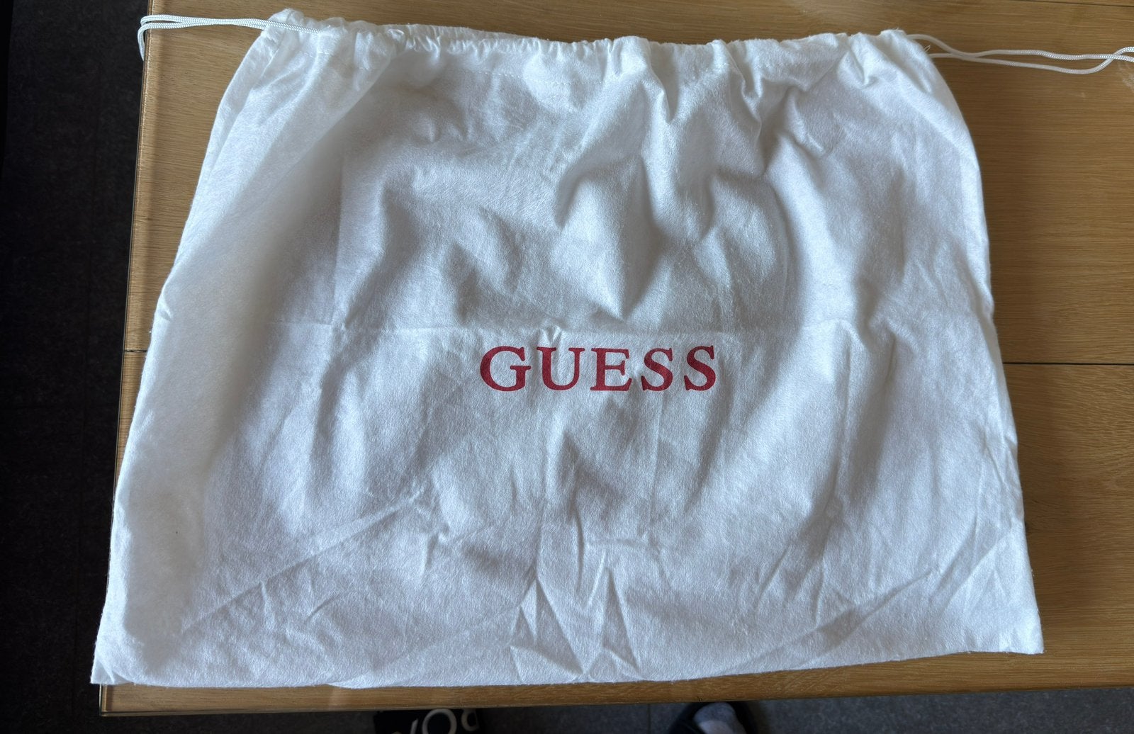 Guess buideltas, Ophalen of Verzenden, Zo goed als nieuw