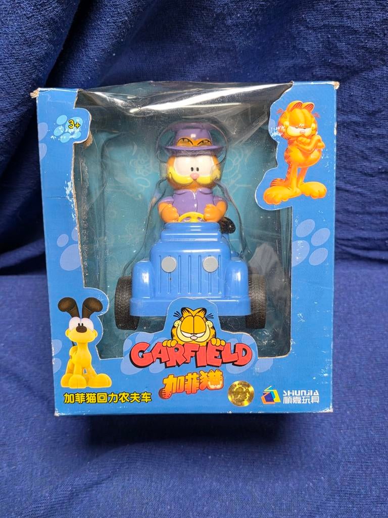 Très rare figurine et jeep Garfield.  Vintage asia. Cette fi