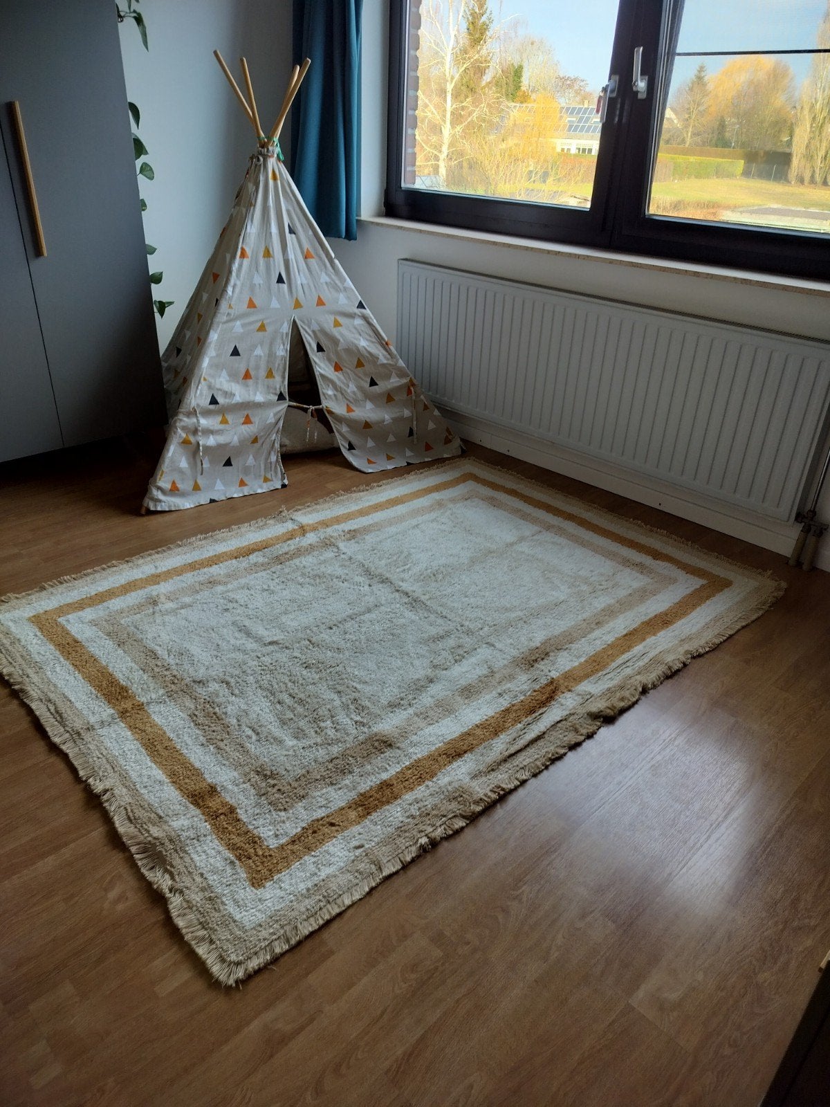 Tapijt kinderkamer, Ophalen