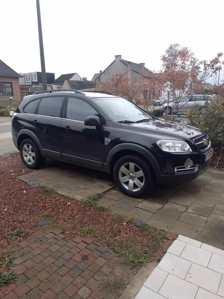 Chevrolet Captiva diesel bj2010 km210000., Auto's, Zwart, Zwart, Leder, 5 deurs
