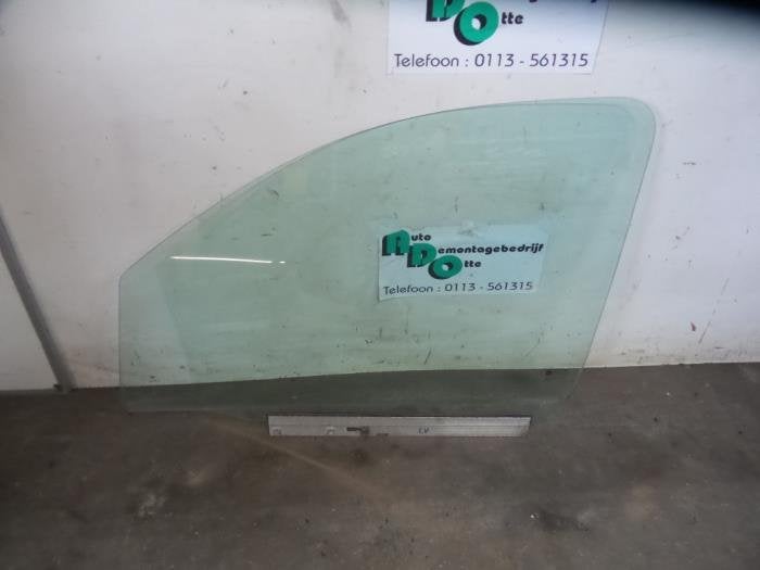 Vitre portière 2portes gauche d'un Opel Combo (Combo 02-), -, Opel, 3 mois de garantie, Utilisé