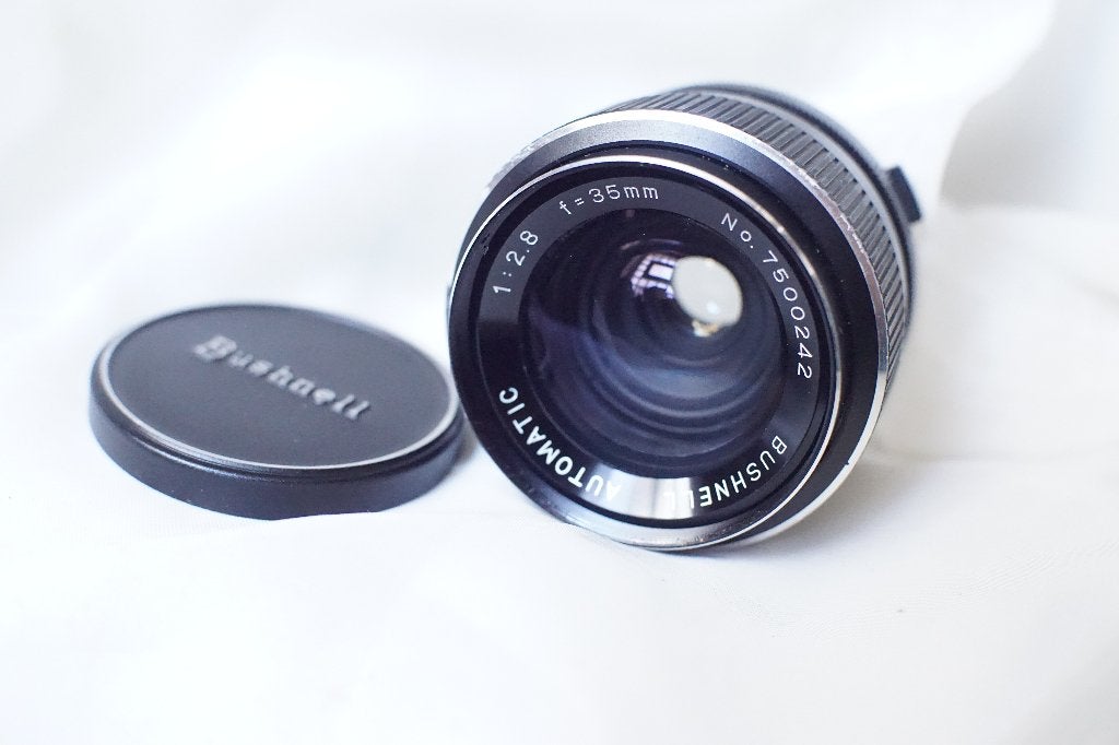 Bushnell 35mm f/2.8 grand  Angle / Olympus OM Mount Lens, TV, Hi-fi & Vidéo, Appareils photo analogiques, Enlèvement ou Envoi