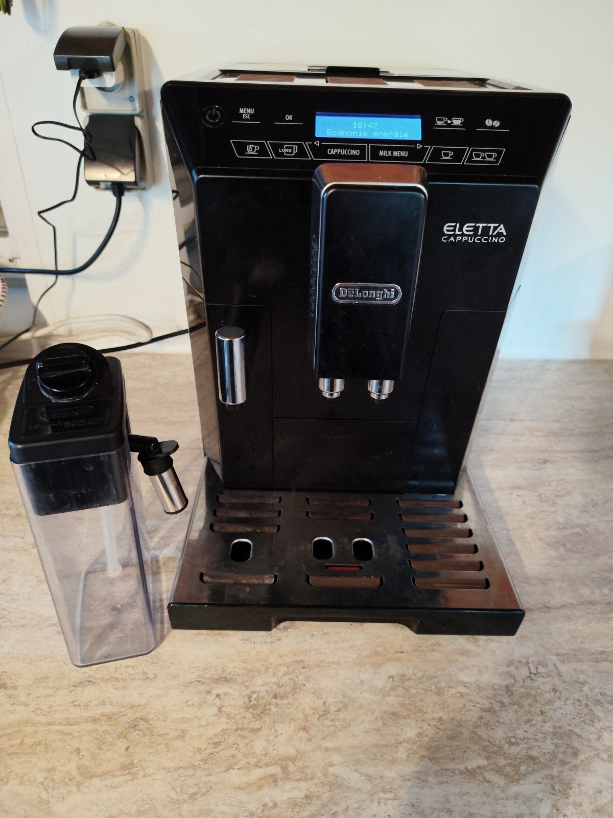 machine a café Delonghi eleta cappuccino, Ophalen