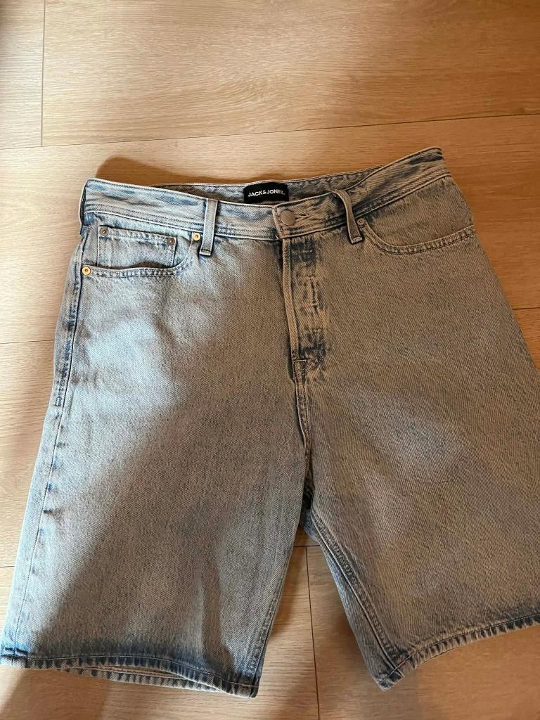 jeans short baggy jack jones blauw medium, Kleding | Heren, Spijkerbroeken en Jeans, Ophalen of Verzenden, Gedragen, Blauw, W33 - W34 (confectie 48/50)