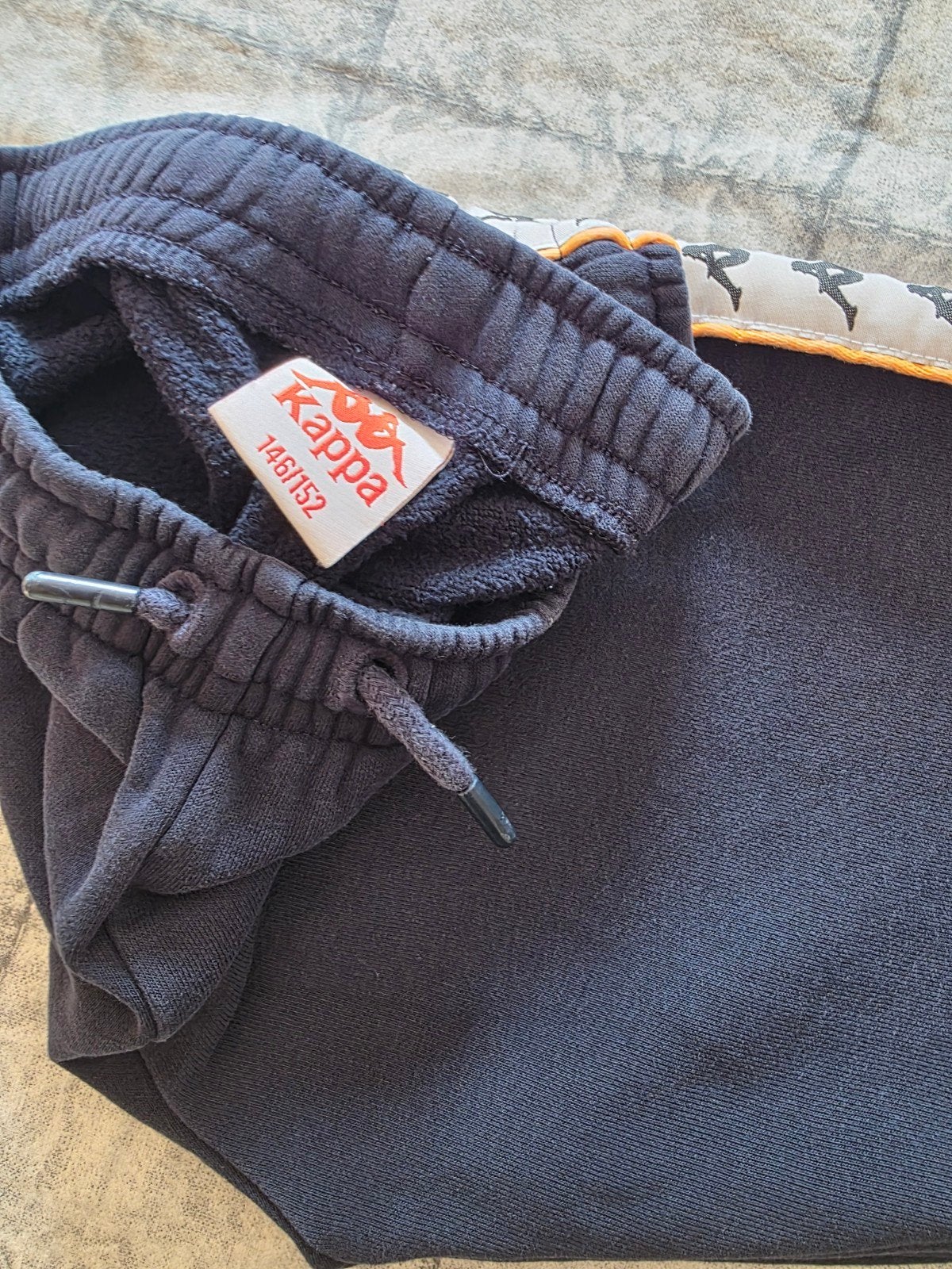 Joggingbroek, Ophalen