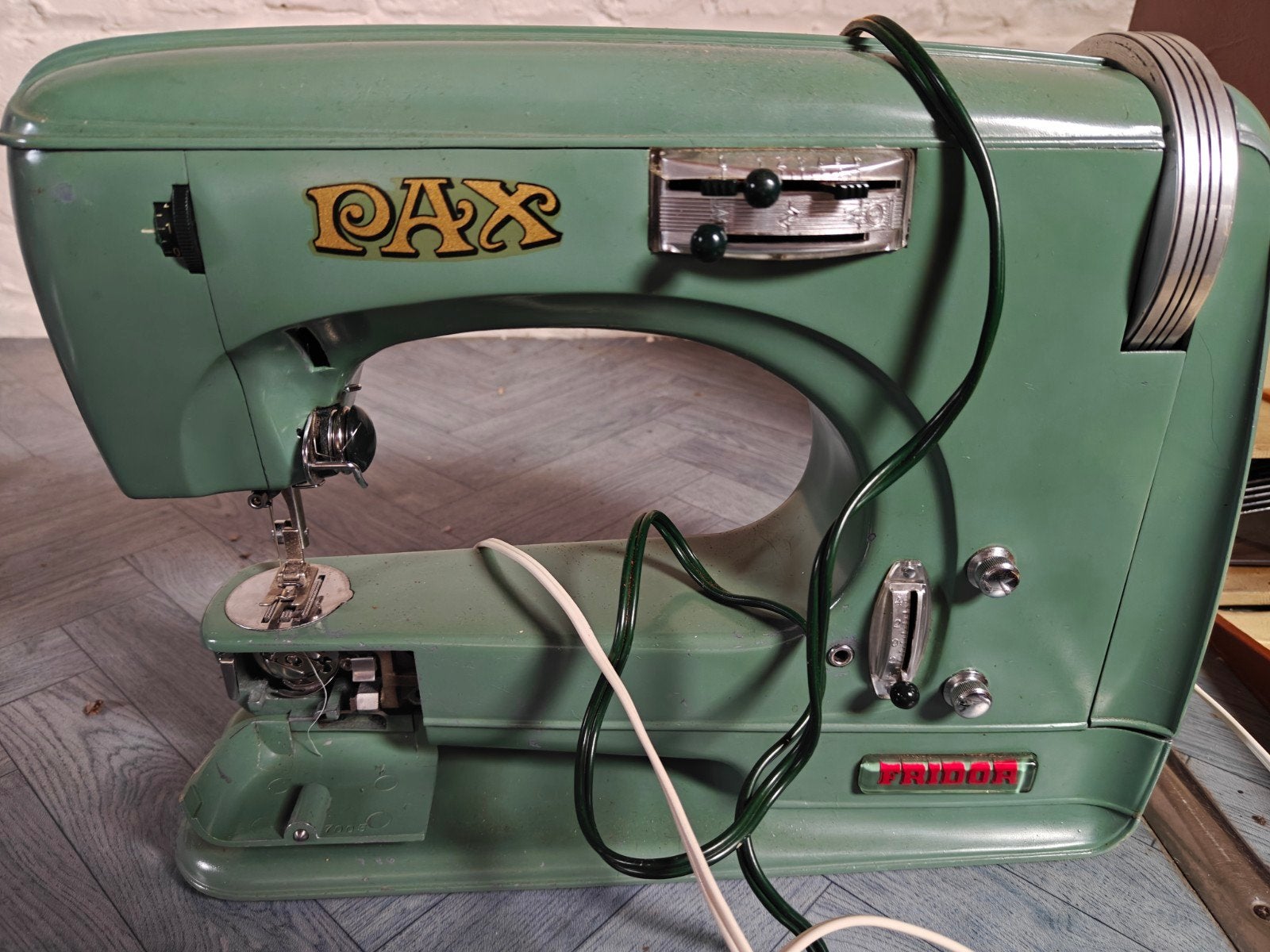 machine a coudre pax, Ophalen