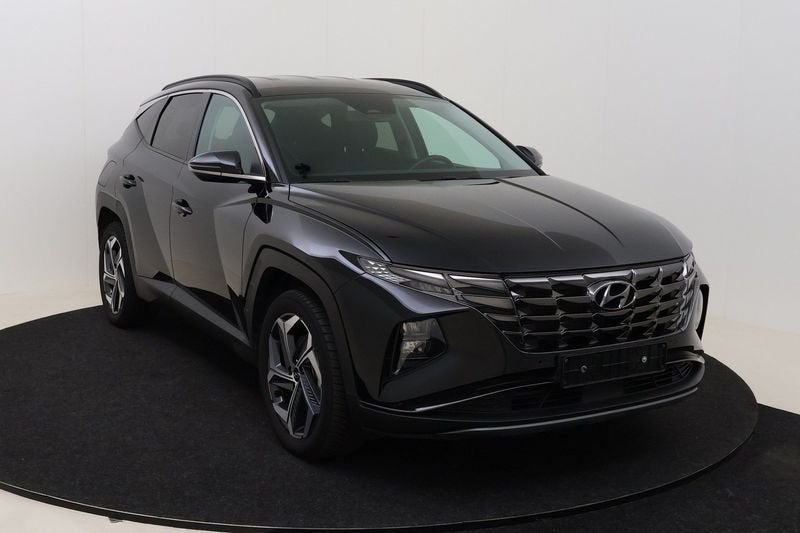 Hyundai Tucson Feel Smart+ PHEV 1.6 T-GDi 6AT 4WD, Auto's, Automaat, Stof, Gebruikt, Euro 6