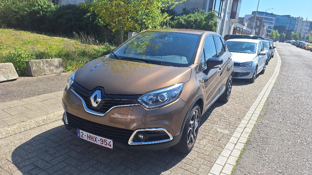 Renault Captur TCe Iconic (2016) - 71.639km - Automaat, Auto's, Renault, Lederen bekleding, 87 kW, Euro 6, Bruin