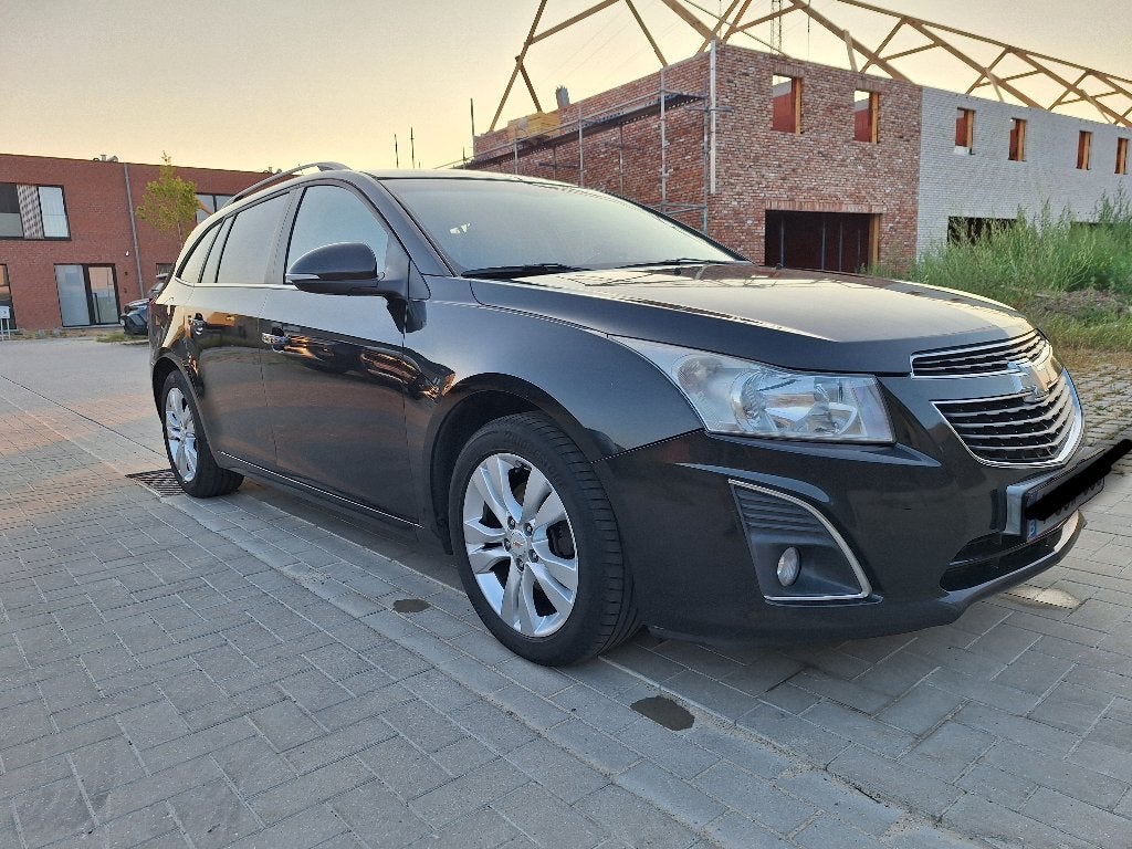 Chevrolet Cruze SW 1.7D 2014 (beschikbaar vanaf ca. okt-nov), Auto's, Voorwielaandrijving, Euro 5, Zwart, Leder en Stof