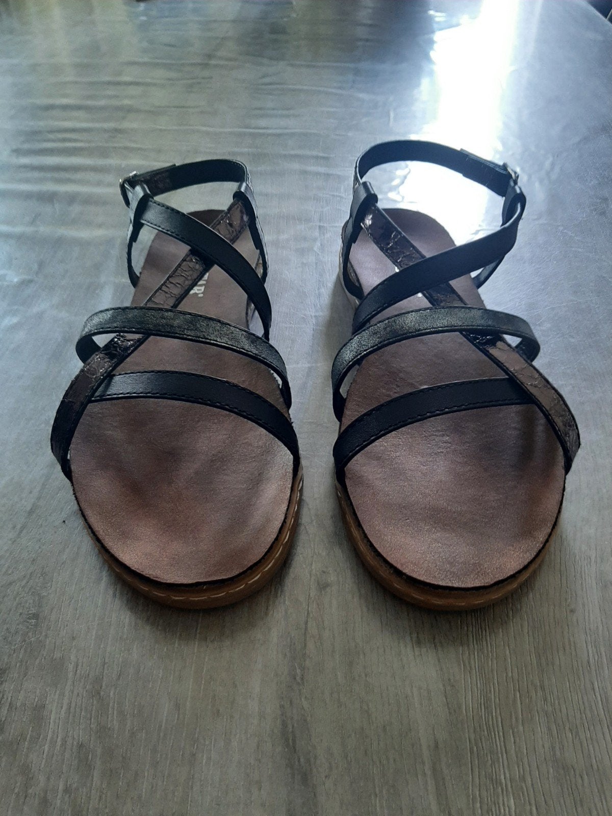 Sandalen, Ophalen