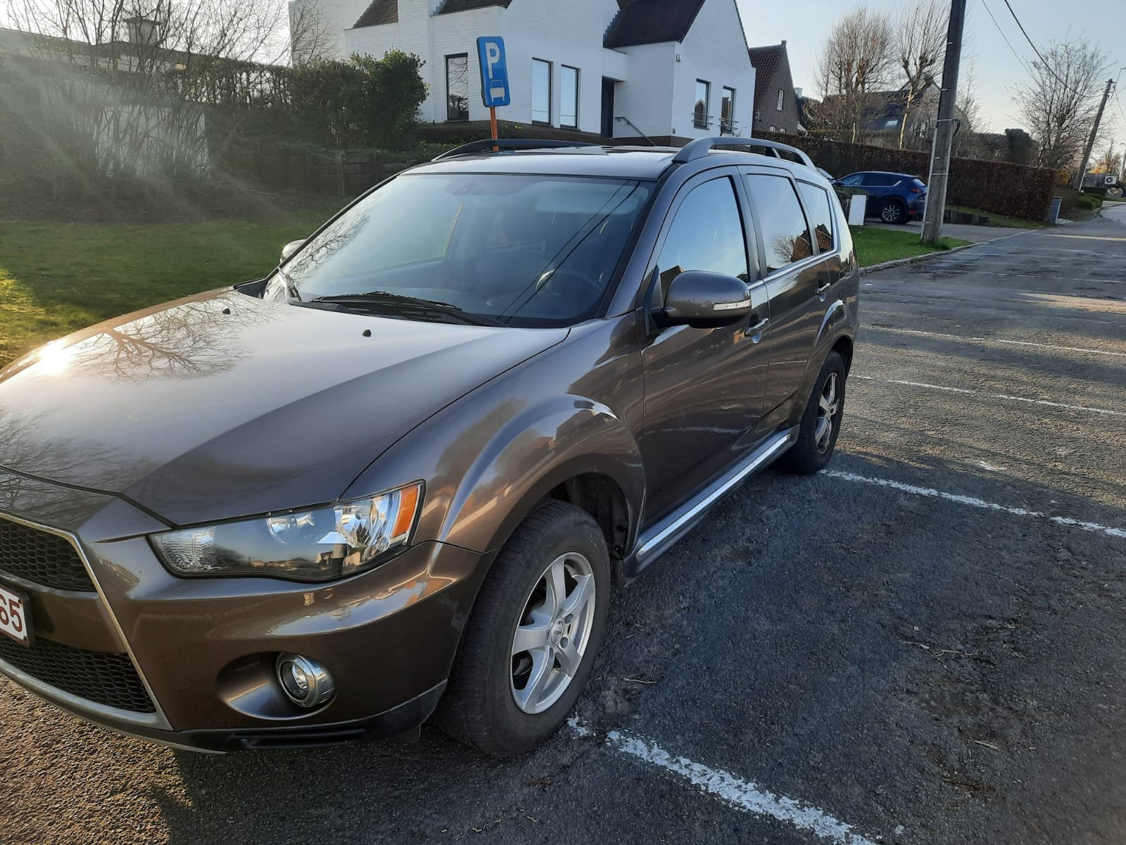 Mitsubishi Outlander met maar 131000 kms, Auto's, Euro 5, Outlander, Zwart, Bruin