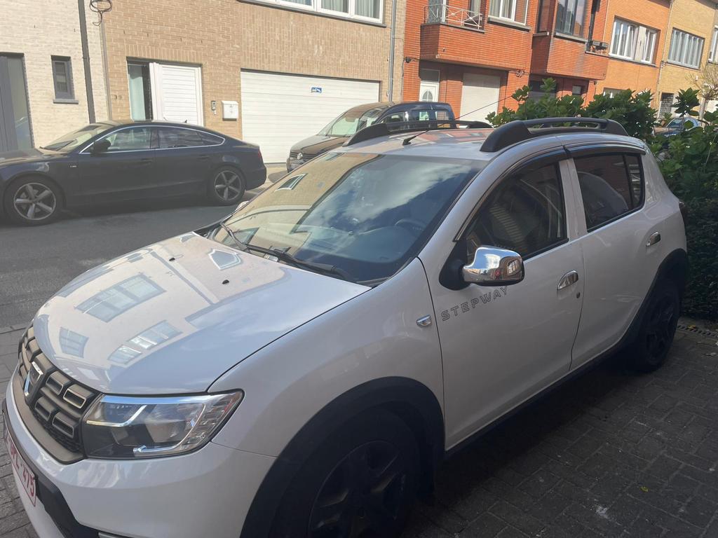 Dacia Sandero Stepway 2017 Essence 0.9l 66kW, Auto's, Dacia, Stof, Parkeersensor, Wit, 5 deurs