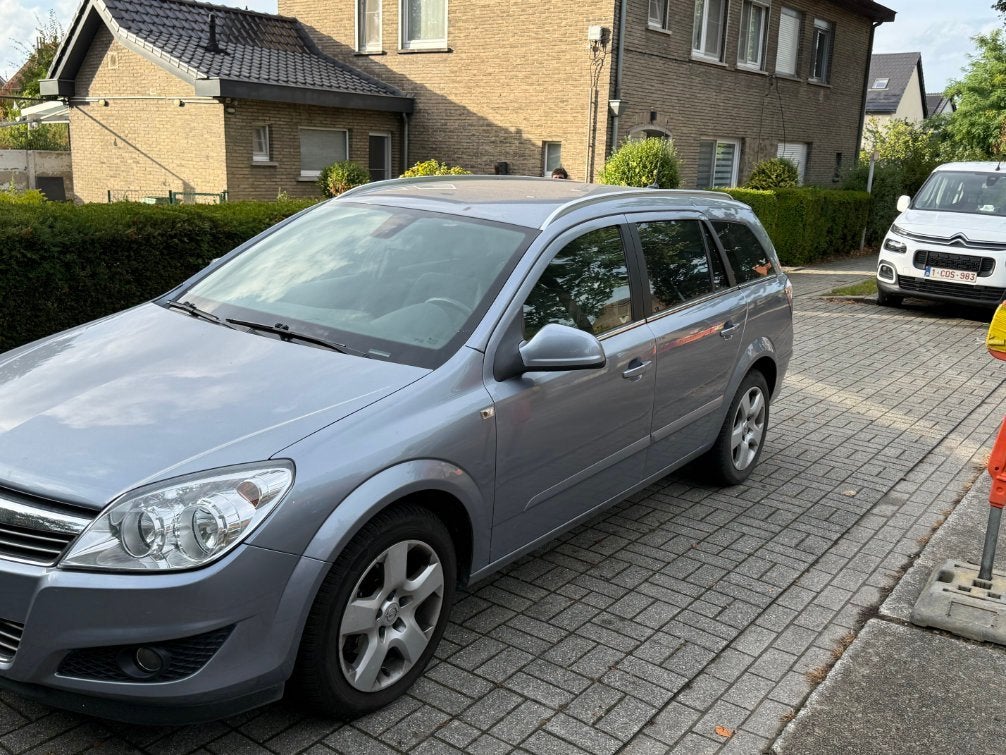 Opel Astra H Caravan 1.4 Benzine 90 pk – 129.394 km, Auto's, Zwart, 146 g/km, Particulier, Euro 4