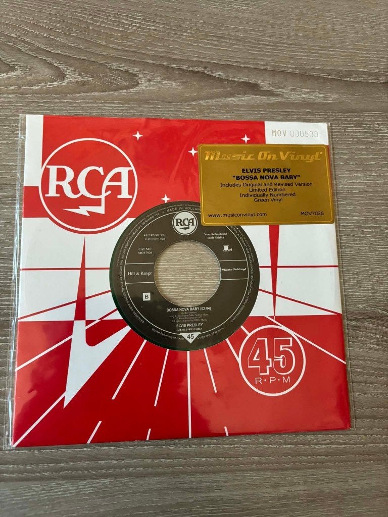 Elvis single, Bossa nova baby, Nieuw. green, vinyl., Cd's en Dvd's, Vinyl Singles, Beschermende buitenhoes, 7 inch, Ophalen of Verzenden
