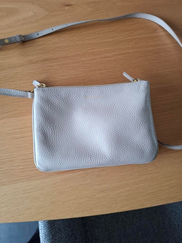 Crossover Coccinelle beige, Handtassen en Accessoires, Ophalen, Nieuw, Beige