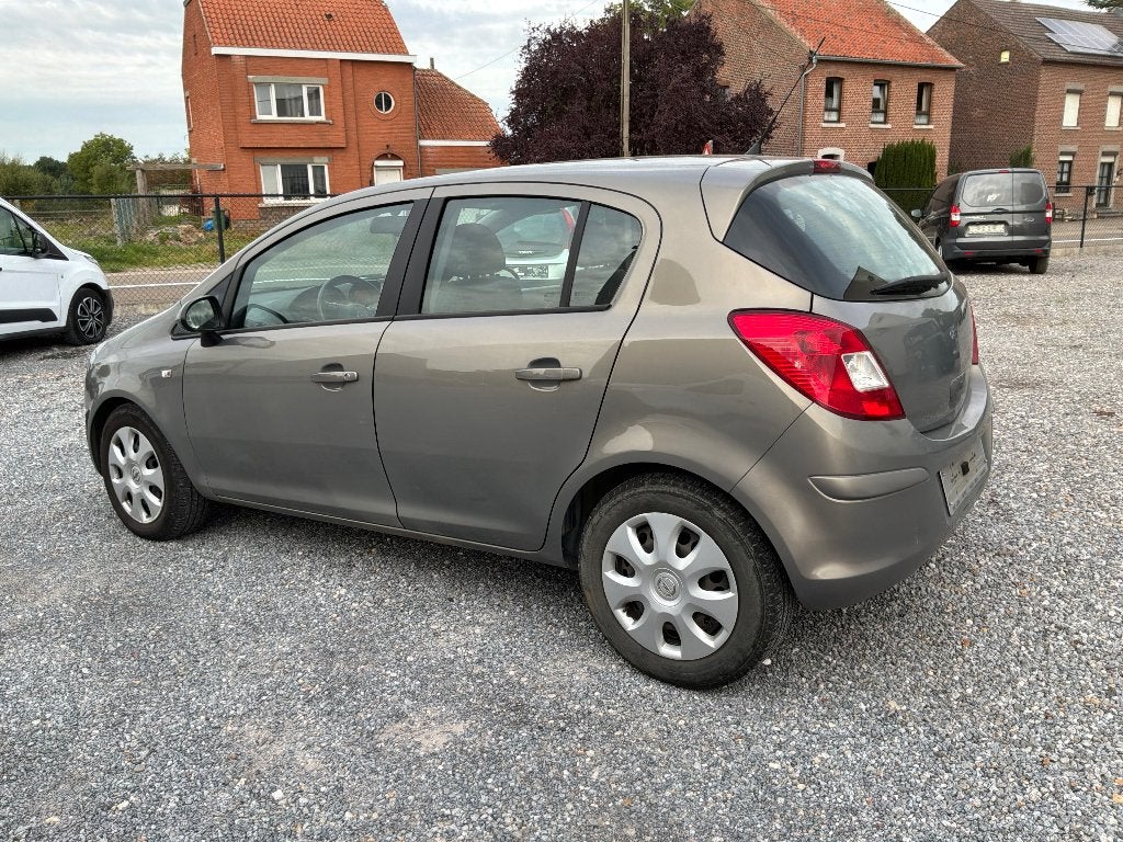 Opel Corsa, Auto's, Euro 5, https://public.car-pass.be/vhr/89874970-118b-4ed3-9303-c6de9f133610, 63 kW, Bruin
