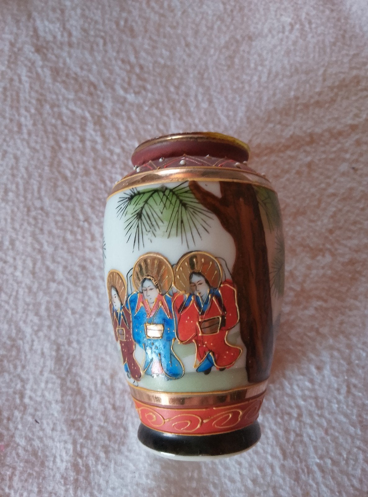 klein Japans vaasje, Ophalen