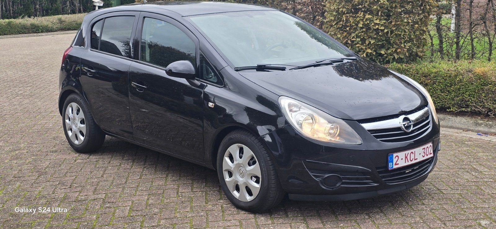 Opel Corsa 1.2 i Gekeurd+Car-Pass 94000 klm, bw 2010, Euro5, Autos, Euro 5, Achat, Boîte manuelle, Noir