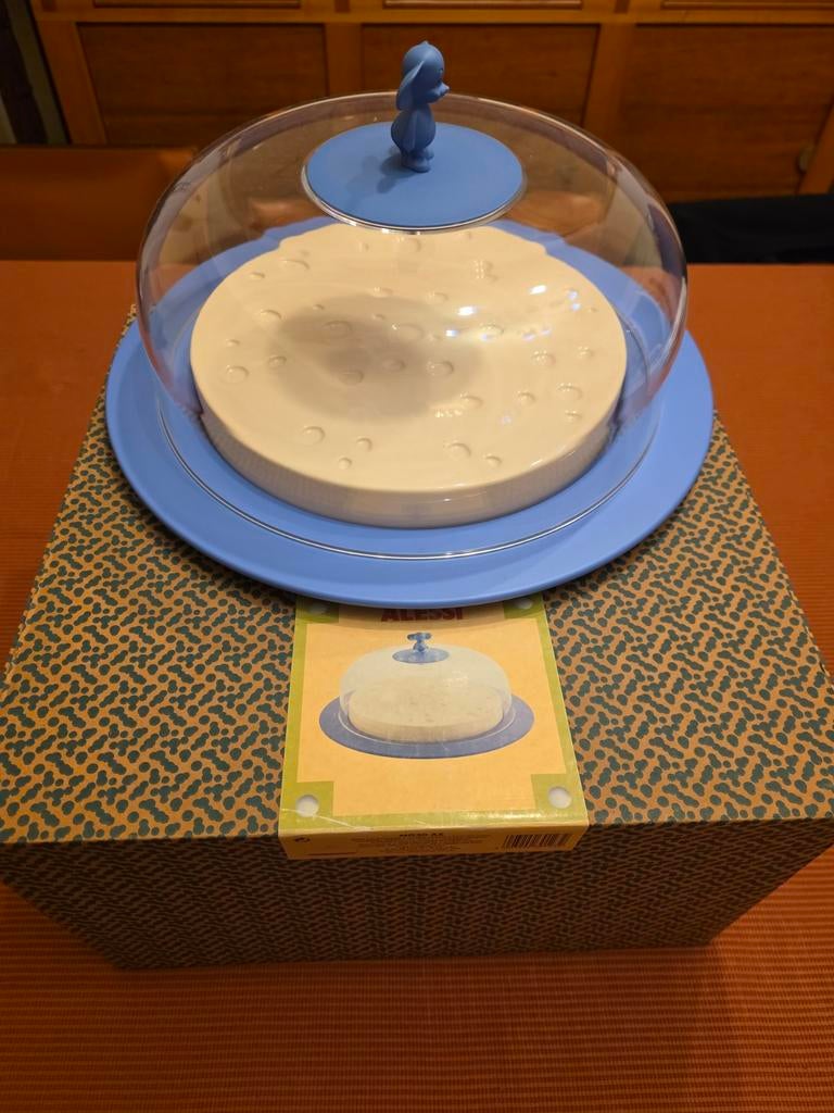Cloche et plateau à fromage Alessi, Ophalen