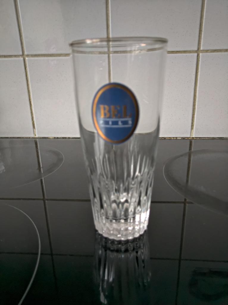 GLAS BEL PILS TE KOOP, Verzamelen, Ophalen of Verzenden, Zo goed als nieuw, Bierglas