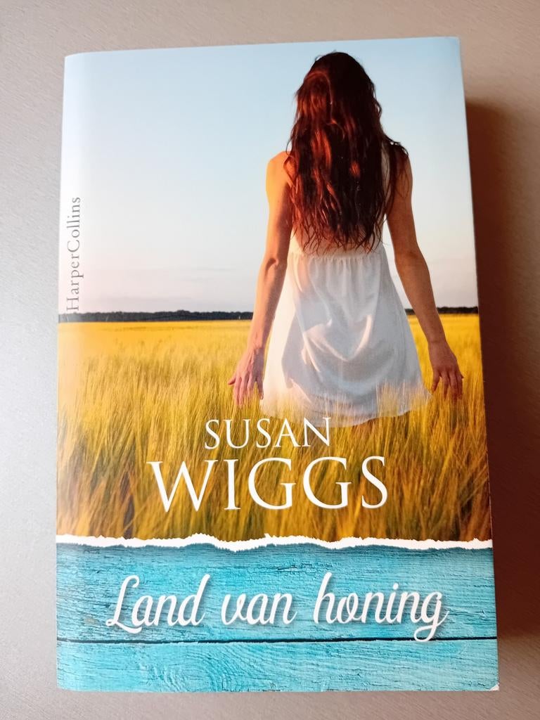 Susan Wiggs - Land van honing, Boeken, Romans, Zo goed als nieuw, Ophalen of Verzenden