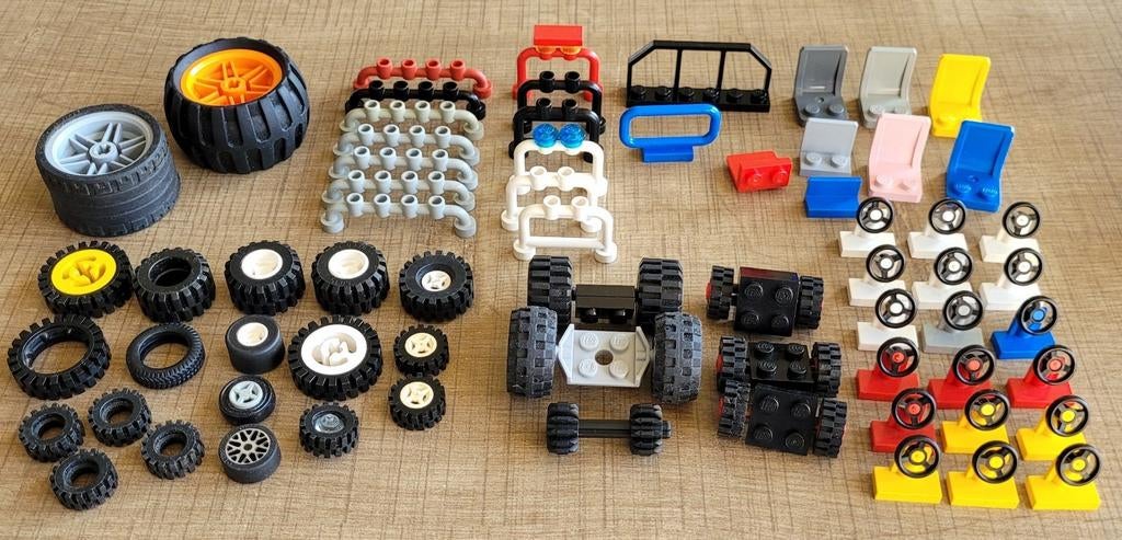 Lego onderdelen voor voertuigen: wielen, stuurtjes, zitjes.., Ophalen of Verzenden, Gebruikt, Losse stenen, Lego