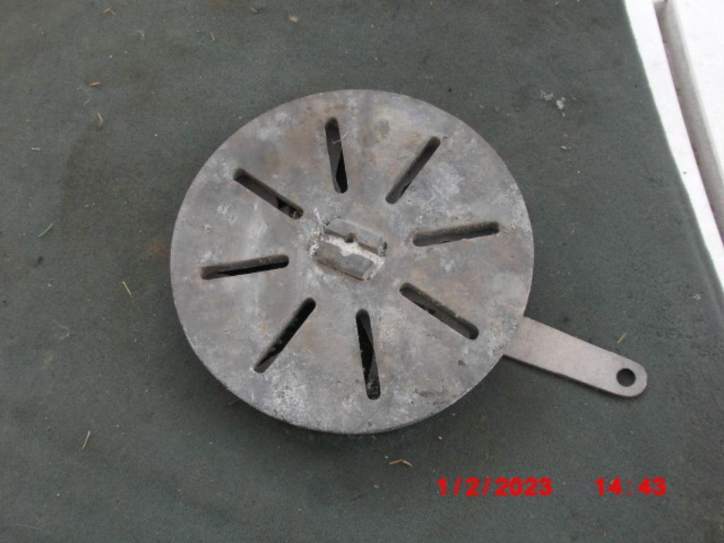 flam schudrooster / flam hendel / flam bovenplaat, Ophalen