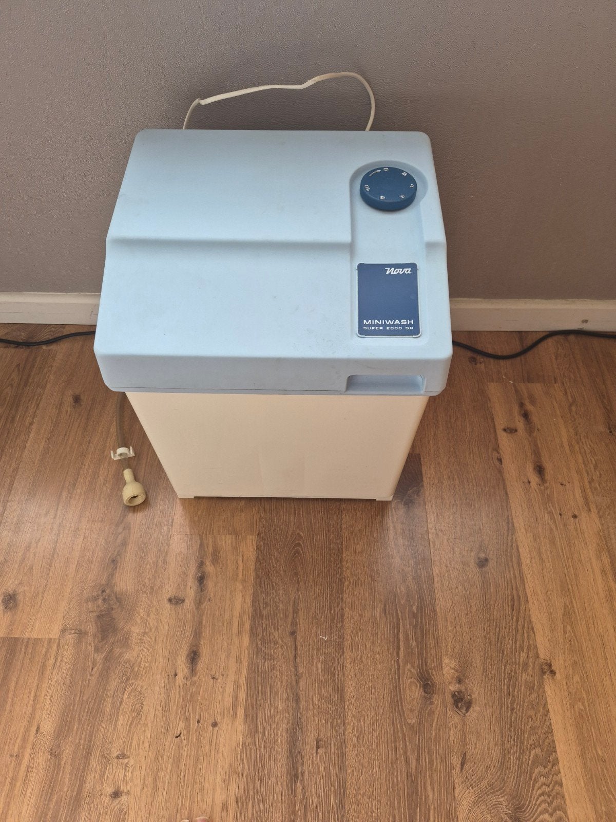 mini wasmachine, Enlèvement