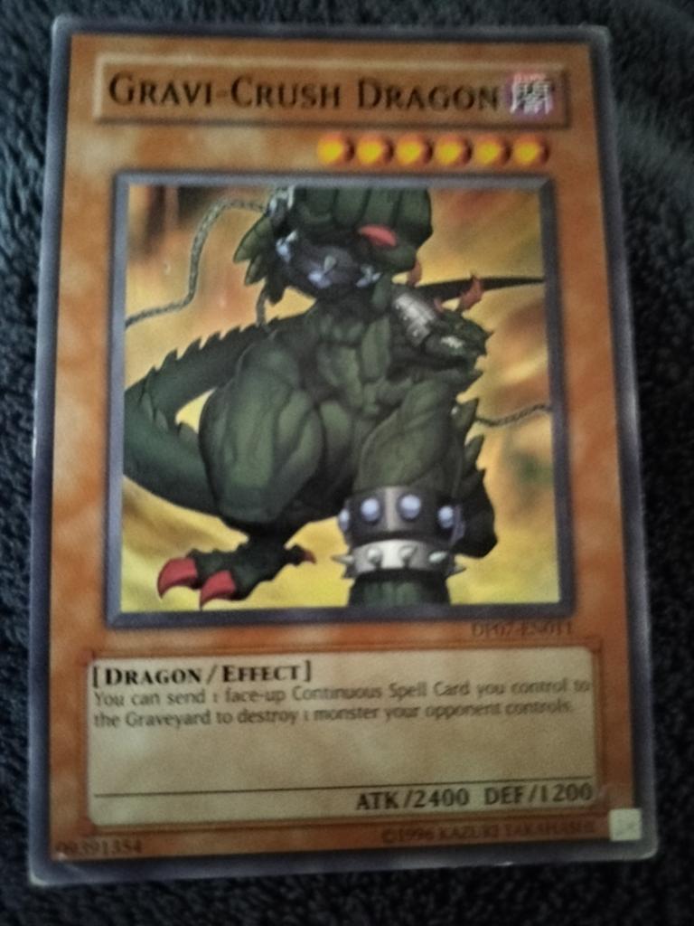 Yu-Gi-Oh kaart Grave Crush Dragon, Hobby en Vrije tijd, Verzamelkaartspellen | Yu-gi-Oh!, Ophalen