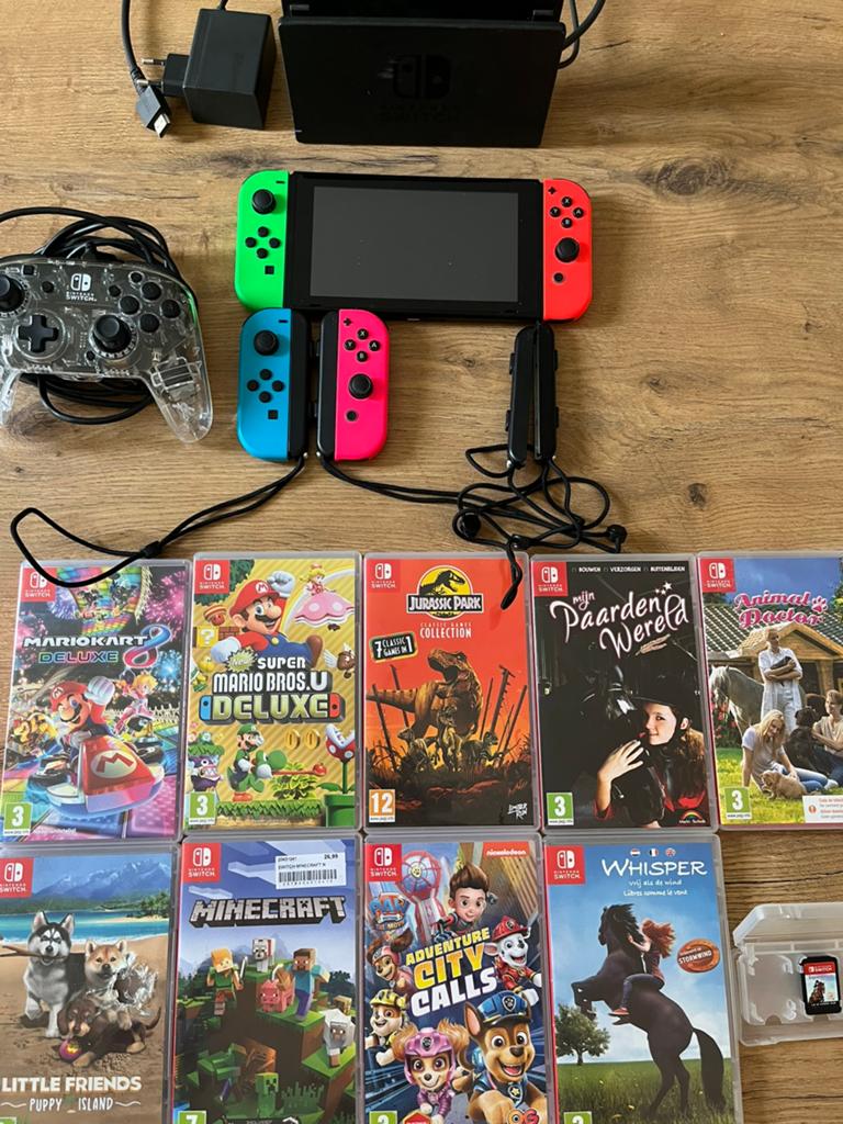 Nintendo Switch et 10 jeux, Consoles de jeu & Jeux vidéo, Consoles de jeu | Nintendo Switch, Enlèvement ou Envoi, Utilisé