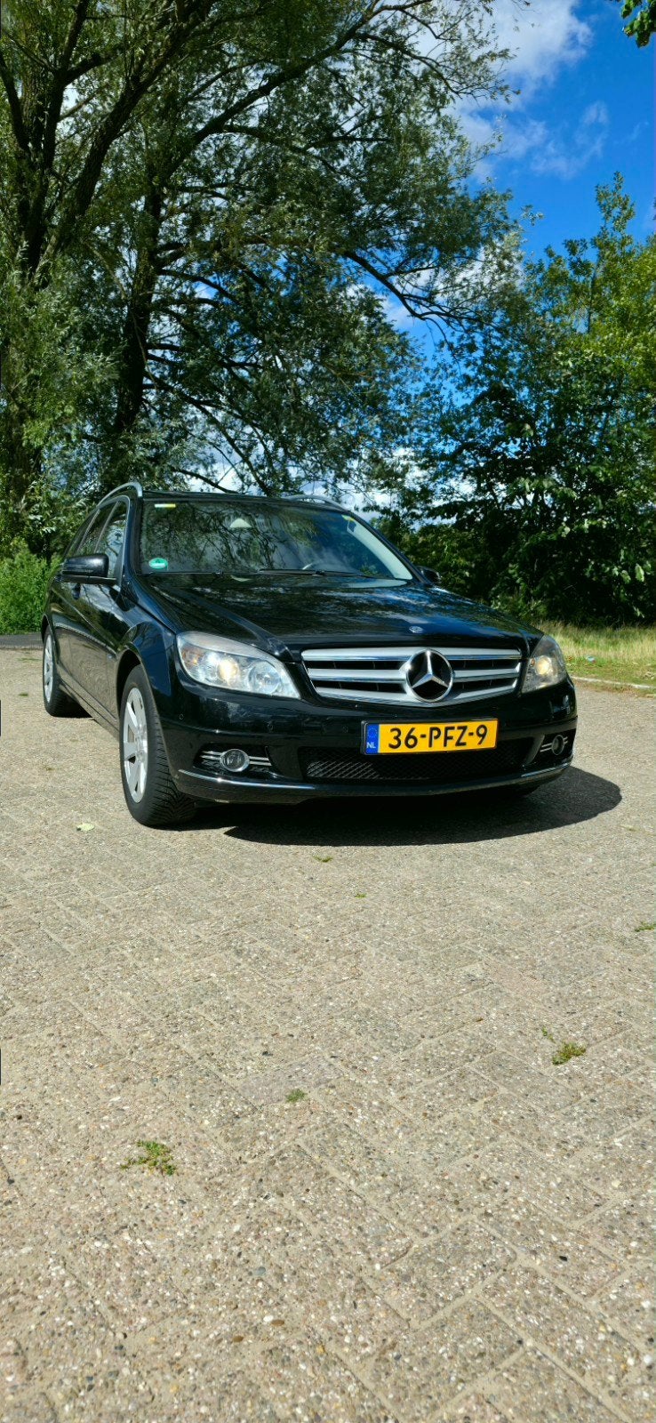 Mercedes-Benz C180 Estate Avantgarde 2011, Auto's, Euro 5, Achterwielaandrijving, Zwart, 4 cilinders