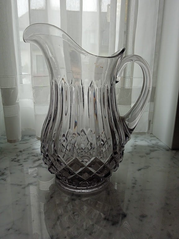 vase en cristal, Enlèvement
