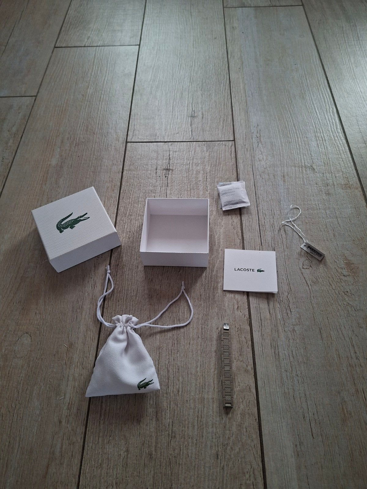 Lacoste Armband, Télécoms, Téléphonie mobile | Accessoires & Pièces, Envoi, Comme neuf, Support de téléphone ou Accessoire, Universel