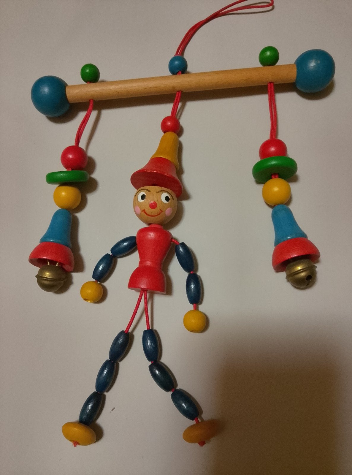 houten speelgoed met belletjes om ergens aan te bevestigen, Ophalen