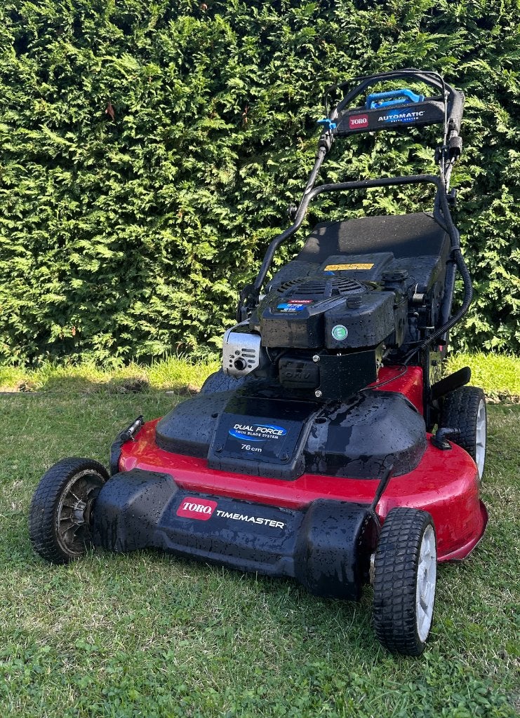 Professionele Toro Grasmaaier te koop., Tuin en Terras, Ophalen, Cirkelmaaier, Zo goed als nieuw, Benzine-grasmaaier