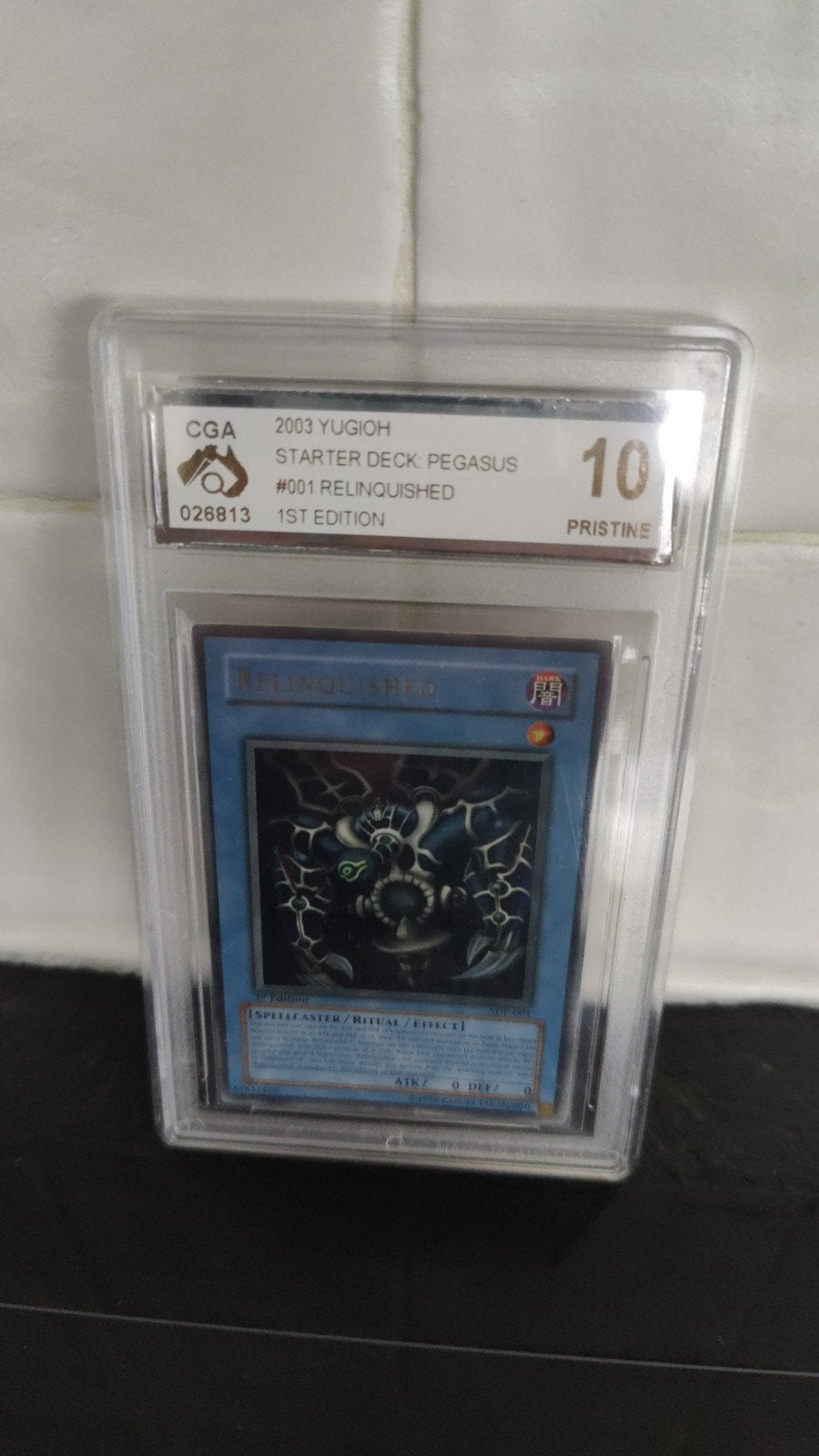 Yugioh Relinquished SDP 1st edition CGA 10 Pristine, Ophalen of Verzenden, Nieuw, Losse kaart, Foil