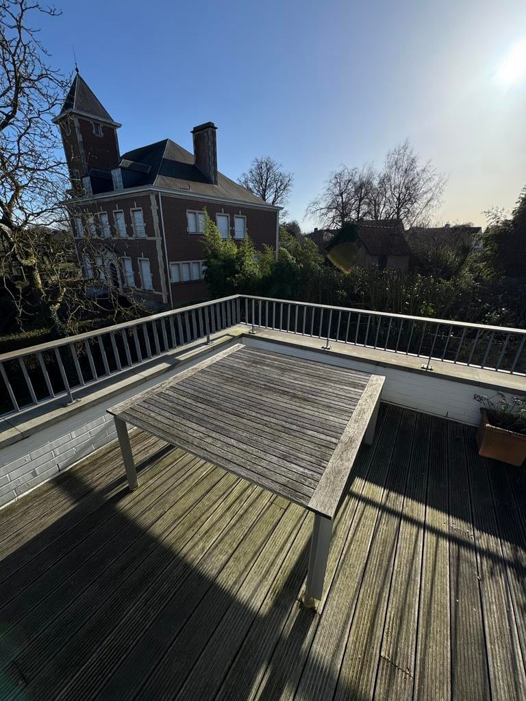 Mooie en stevige eettafel in houtlook te koop., Ophalen, Gebruikt, Hout