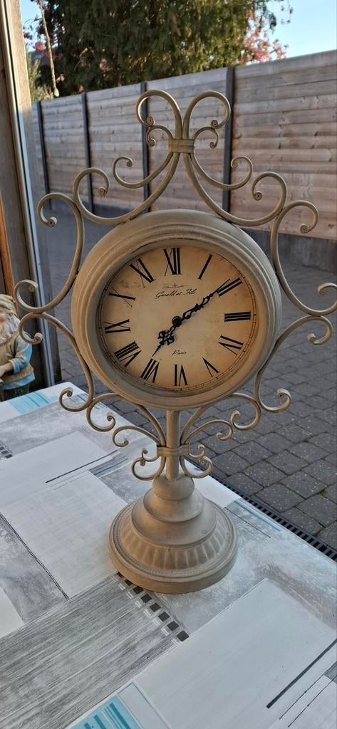 Uurwerk  in ijzer, Ophalen