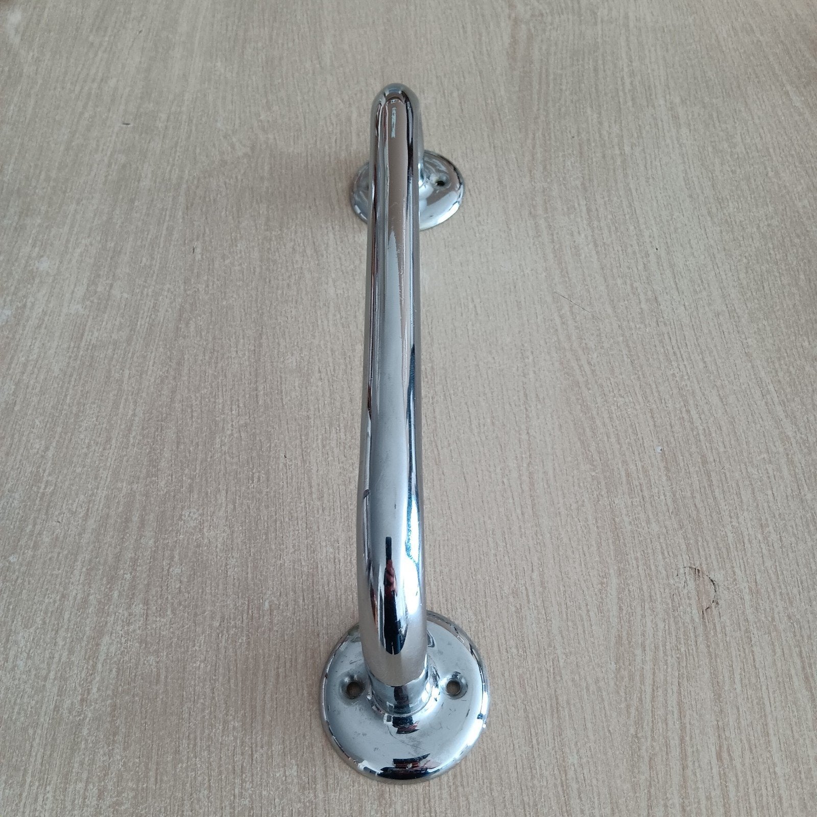 inox wandbeugel, Ophalen
