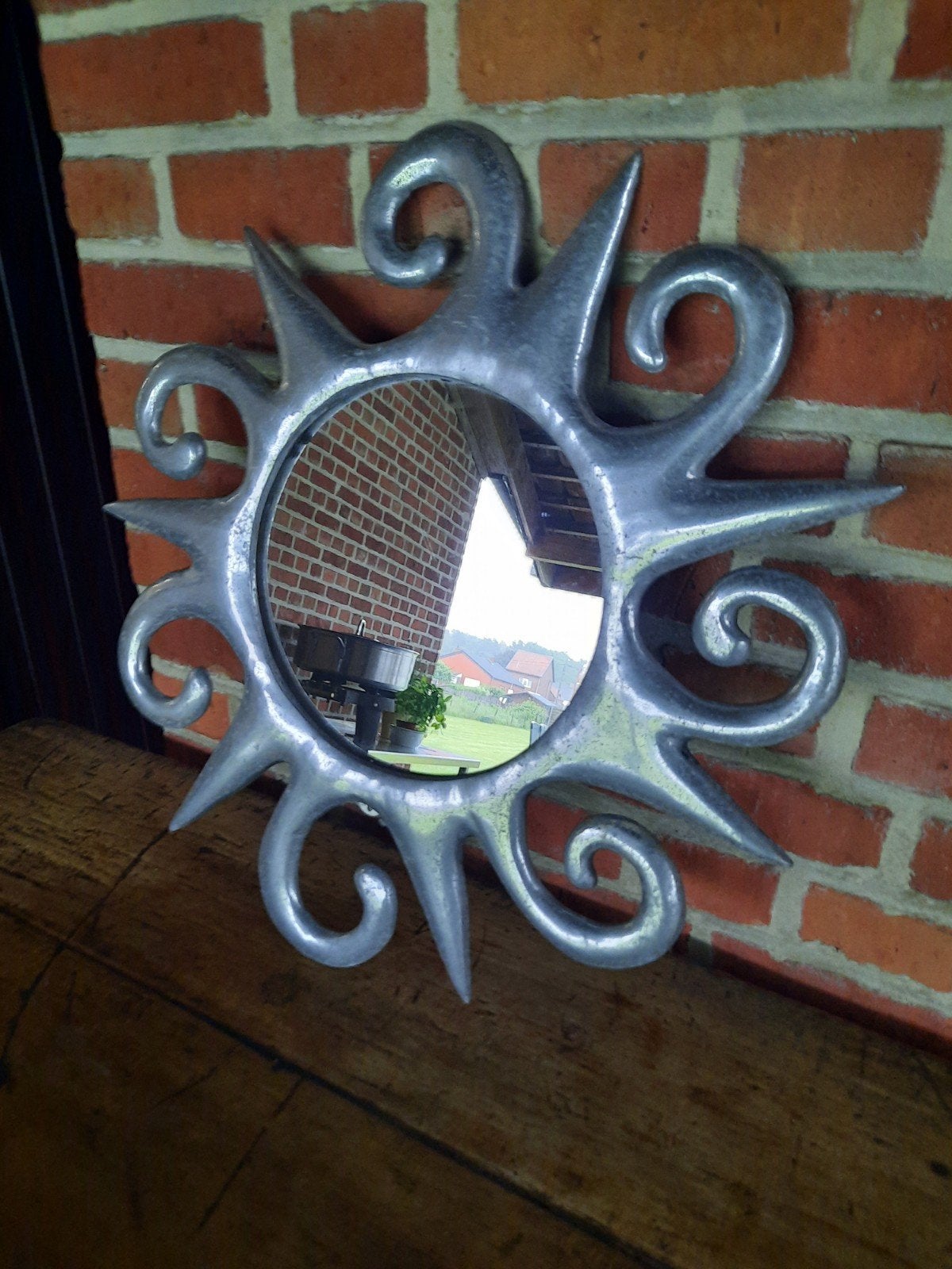 Grote aluminium zonnespiegel uit de jaren 90, Ophalen