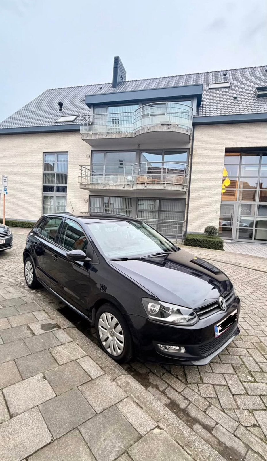 Volkswagen Polo 1.2 Benzine – 2010 – 100k km, Auto's, Euro 5, Stof, Zwart, Handgeschakeld