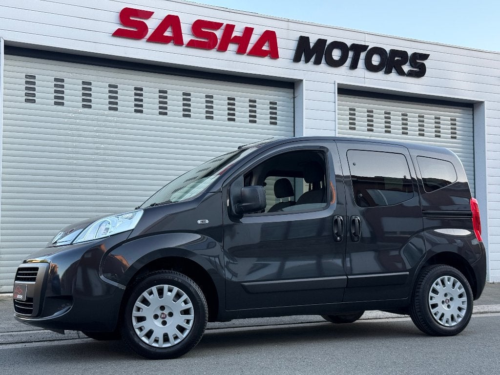 Fiat Qubo 1.4 Benzine '14 | Airco | 70.000 KM | 12MGarantie, Voorwielaandrijving, Parkeersensor, Zwart, Zwart
