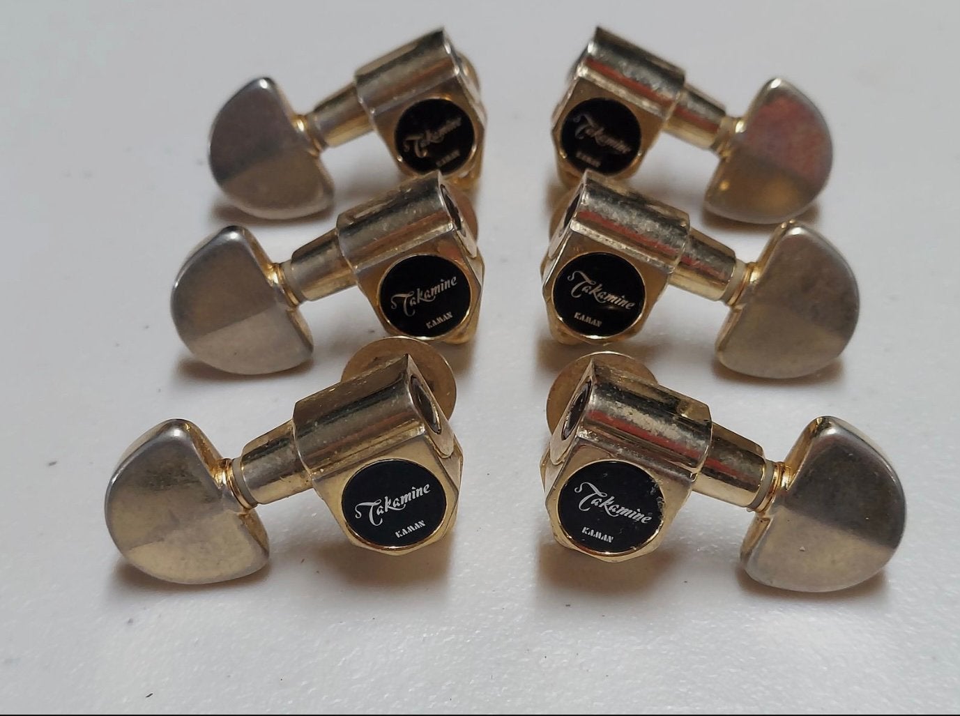 ZOEK Takamine tuners met logo goudkleurig, Musique & Instruments, Enlèvement ou Envoi, Utilisé, Guitare acoustique