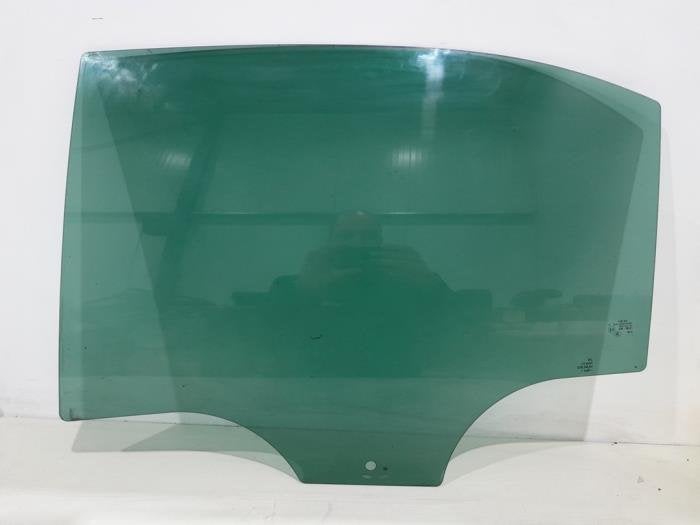 Vitre portière 4portes arrière gauche d'un Skoda Rapid, Autos : Pièces & Accessoires, Vitres & Accessoires, -, 3 mois de garantie