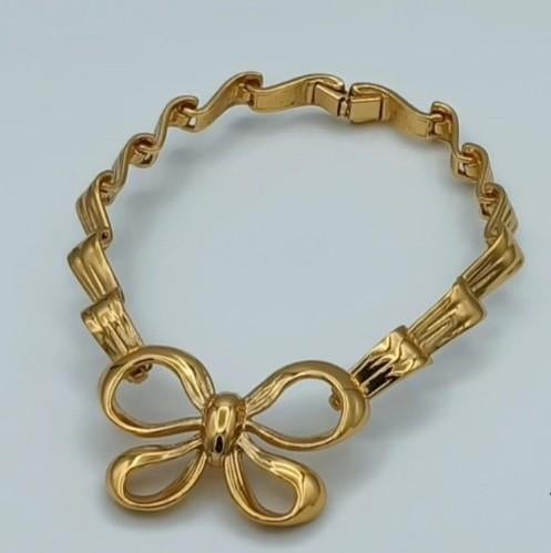 Collier ras du cou Yves Saint Laurent plaquée or, Enlèvement ou Envoi, Comme neuf, Or, Or