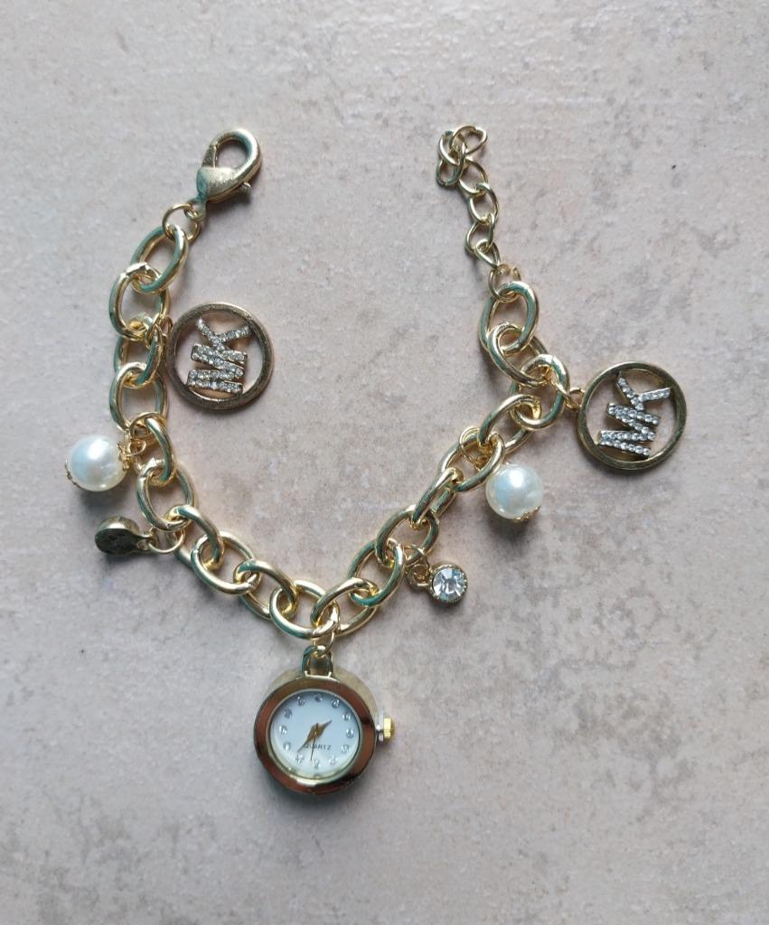 Montre bracelet Mickael Kors, Bijoux, Sacs & Beauté, Bracelets à breloques, Neuf, Autres marques, Enlèvement ou Envoi, 4 bracelets à breloques ou plus